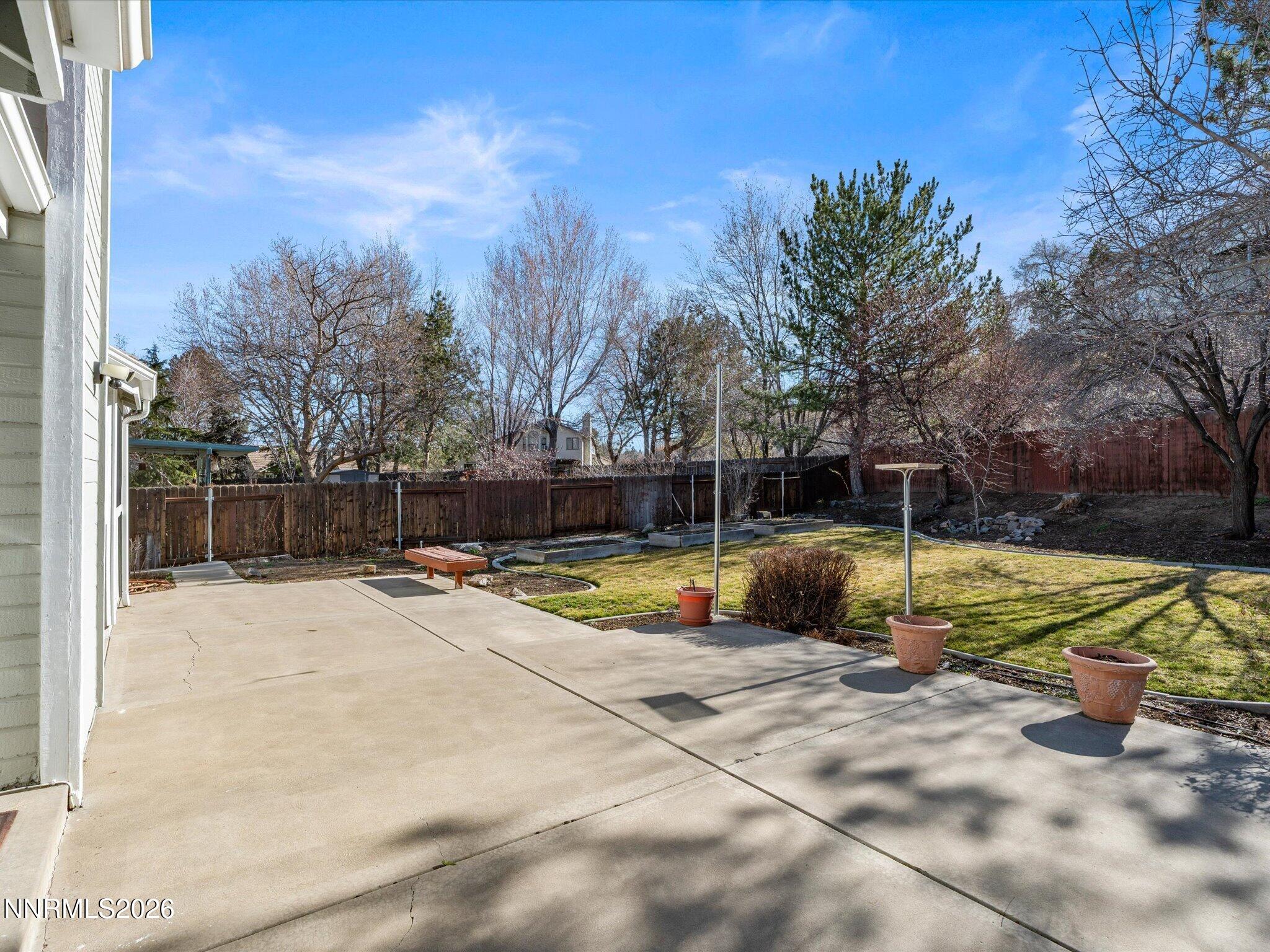 1588 Wheatgrass Drive Reno, NV 89509 - Photo 38 of 42 a view of a swimming pool with a yard