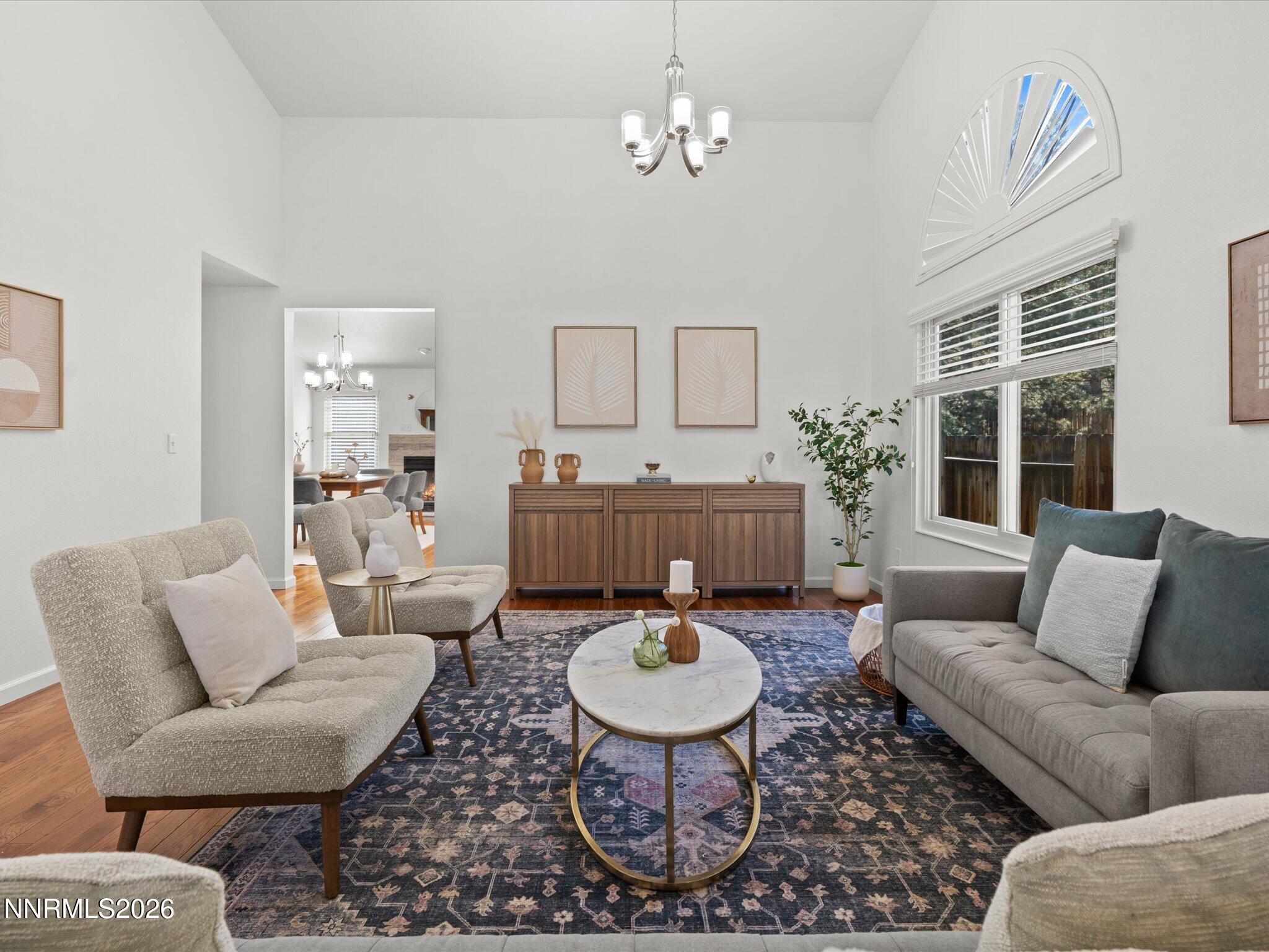 1588 Wheatgrass Drive Reno, NV 89509 - Photo 4 of 42 a living room with furniture a rug and a window
