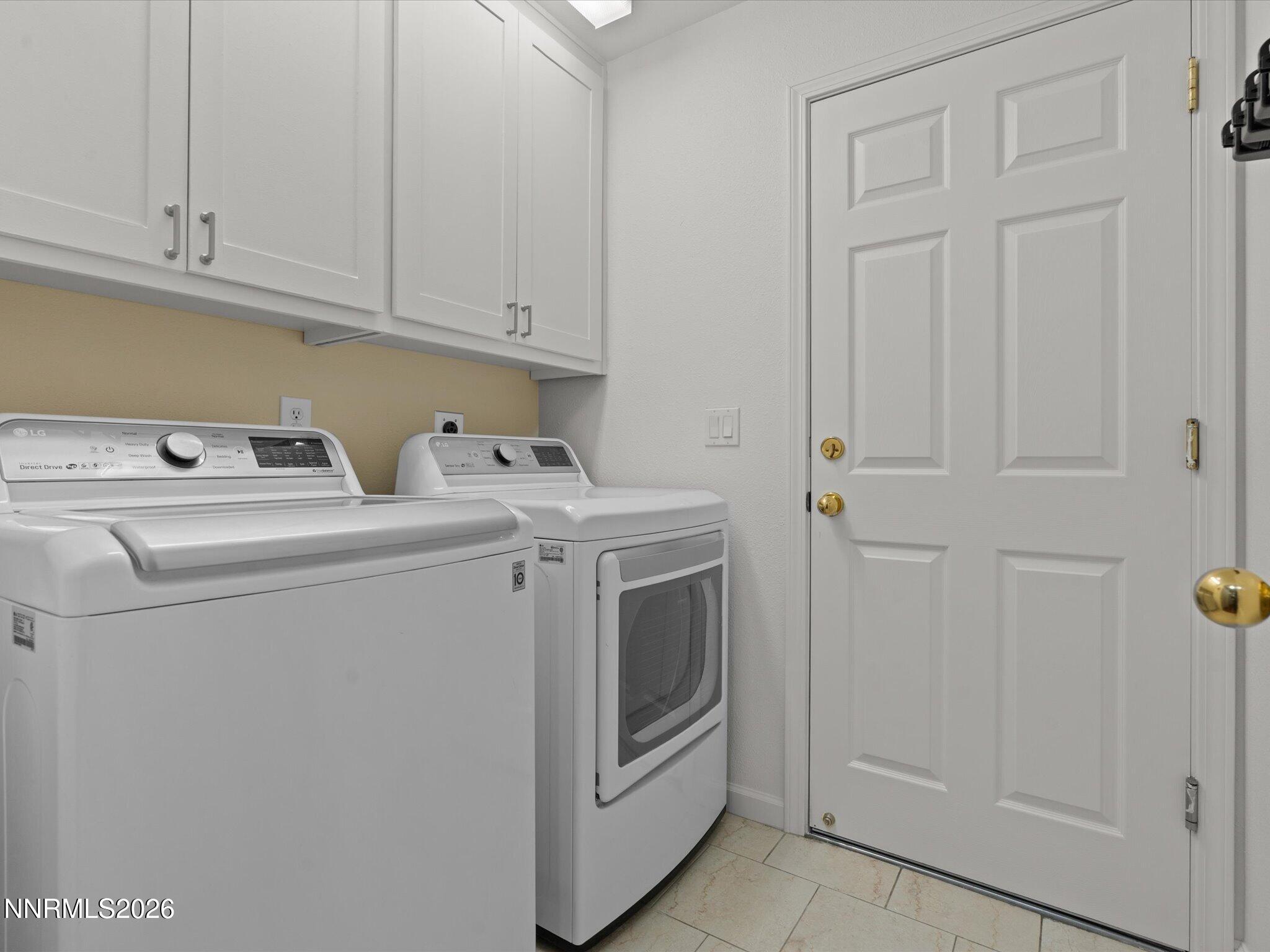 1588 Wheatgrass Drive Reno, NV 89509 - Photo 42 of 42 a utility room with dryer and washer