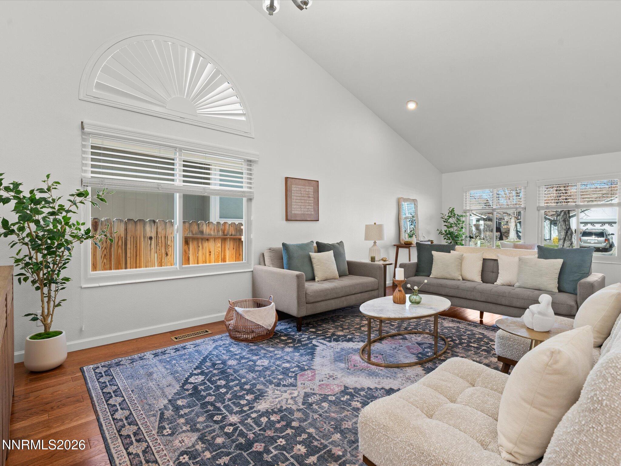 1588 Wheatgrass Drive Reno, NV 89509 - Photo 7 of 42 a living room with furniture and a potted plant