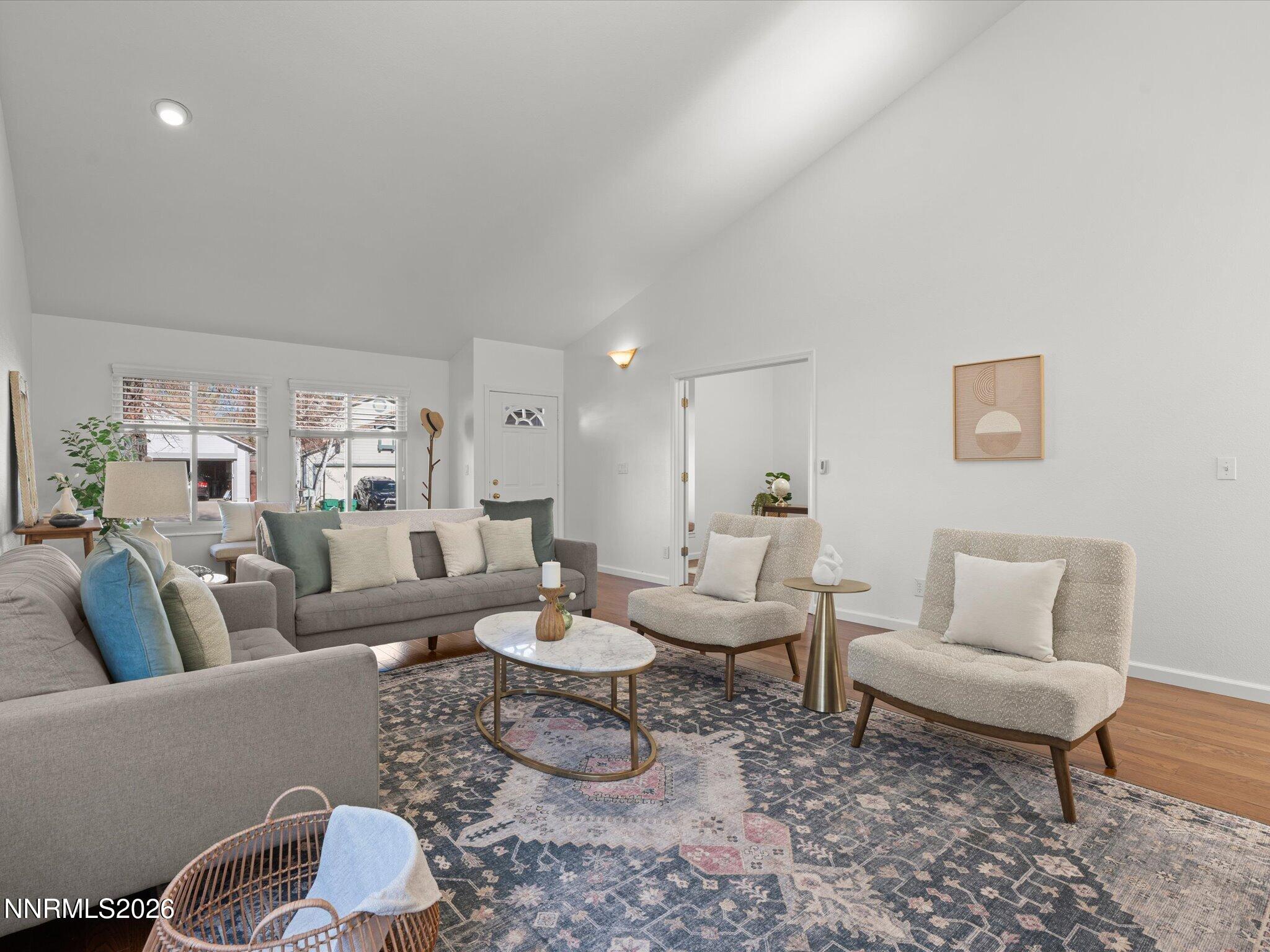 1588 Wheatgrass Drive Reno, NV 89509 - Photo 8 of 42 a living room with furniture and a rug