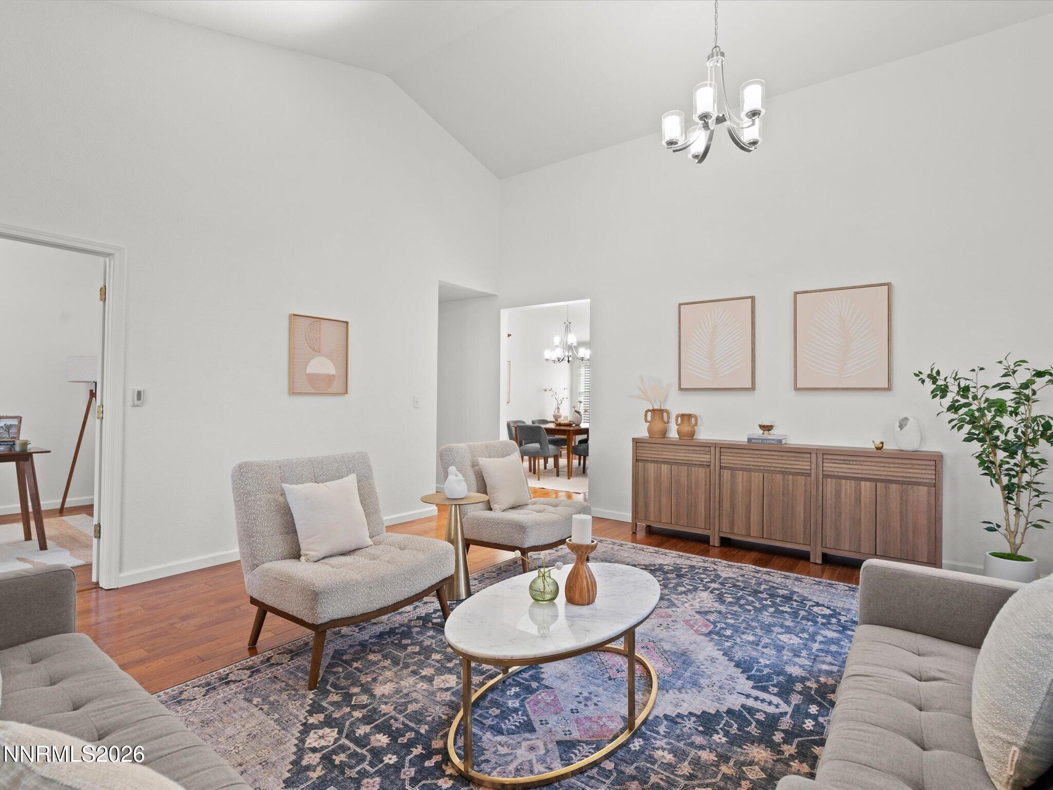 1588 Wheatgrass Drive Reno, NV 89509 - Photo 9 of 42 a bedroom with furniture and a wooden floor