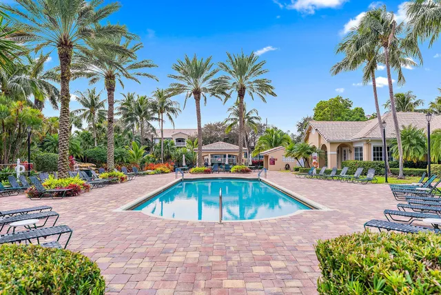 a view of a garden with swimming pool