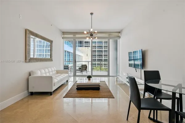 a living room with furniture and a window
