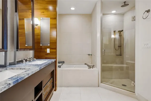 a bedroom with a bed and glass window