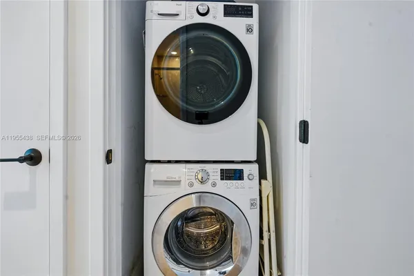 a building outdoor space with patio furniture and garden