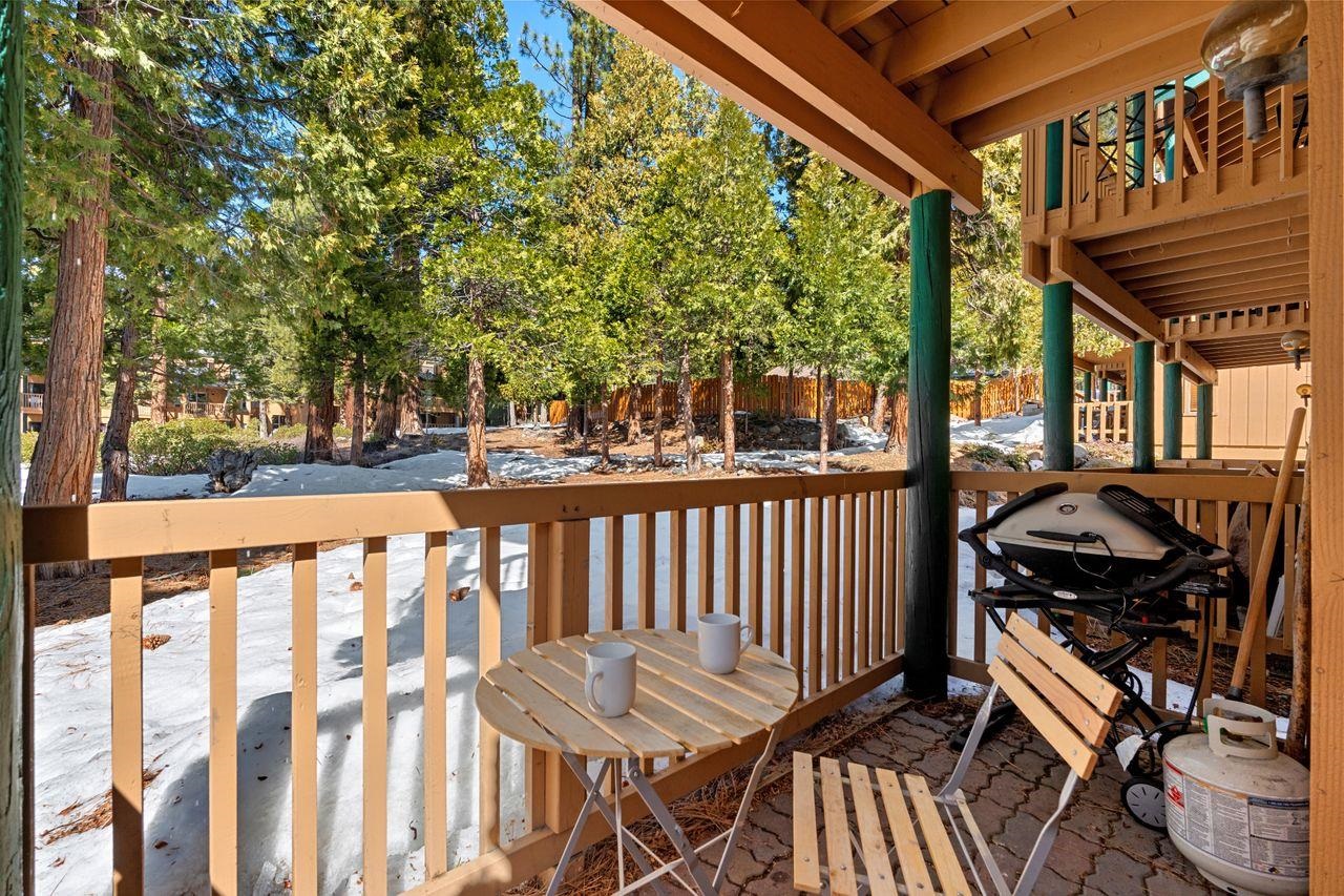 1300 Regency Way, Unit 62 Tahoe Vista, CA 96148 - Photo 12 of 26 a view of balcony with wooden floor and outdoor seating