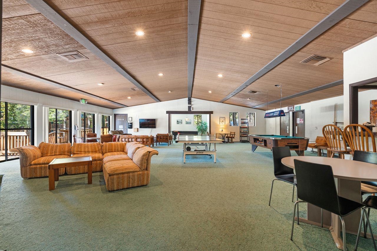 1300 Regency Way, Unit 62 Tahoe Vista, CA 96148 - Photo 19 of 26 a living room with furniture and a large window