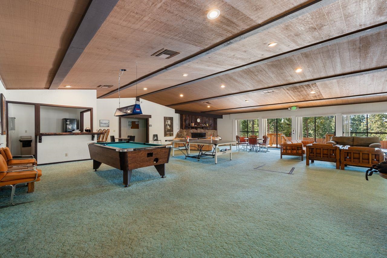1300 Regency Way, Unit 62 Tahoe Vista, CA 96148 - Photo 21 of 26 a living room with furniture and a large window