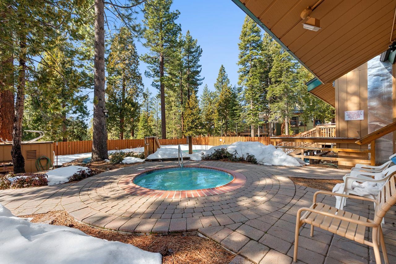 1300 Regency Way, Unit 62 Tahoe Vista, CA 96148 - Photo 23 of 26 a view of swimming pool with lawn chairs and plants