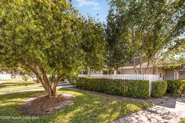a view of backyard with green space