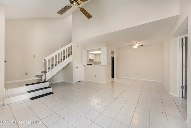 a view of entryway and hall with a window