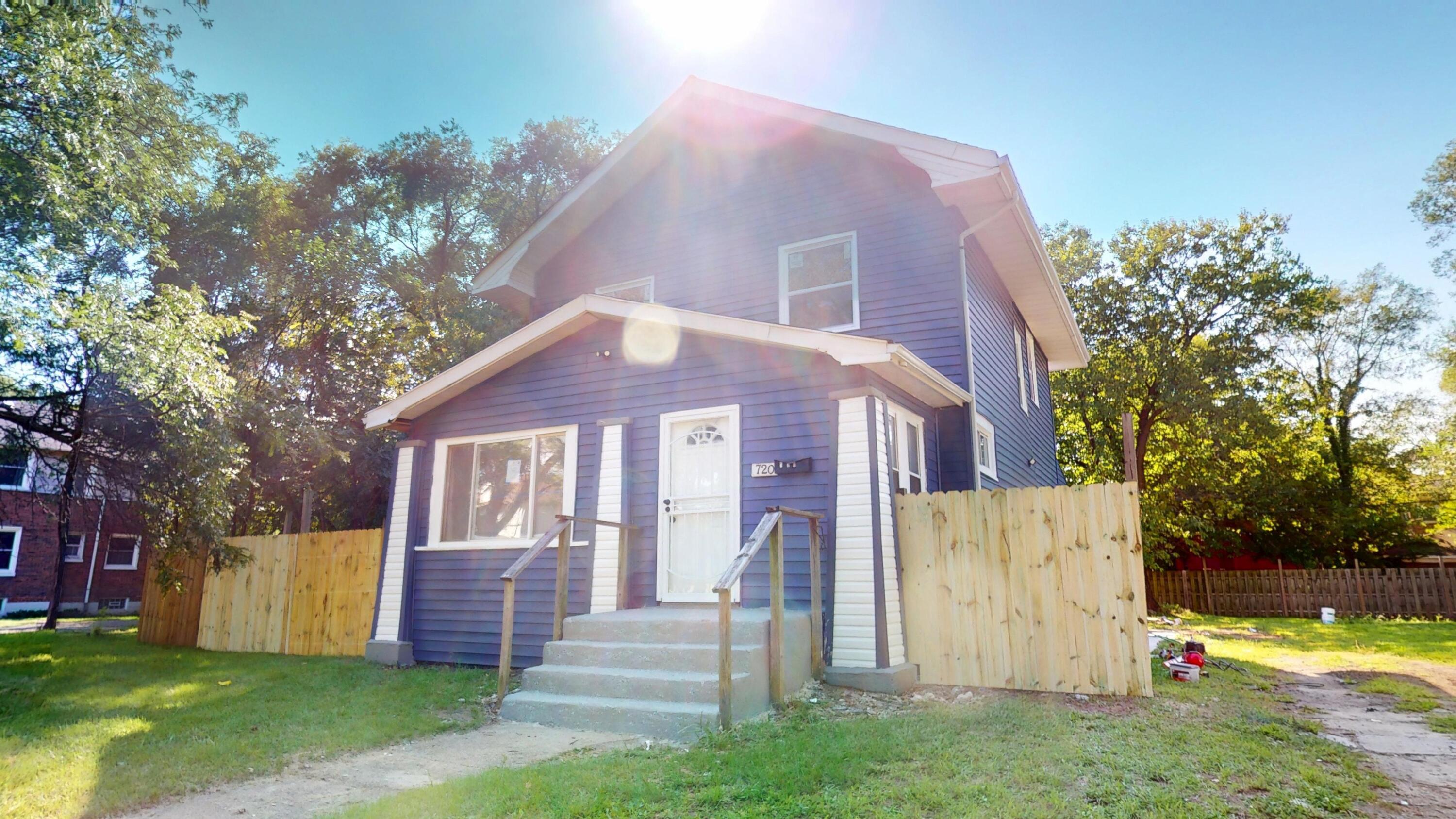 720 Maryland Street Gary, IN 46402 - Photo 32 of 38 a front view of house with yard and green space