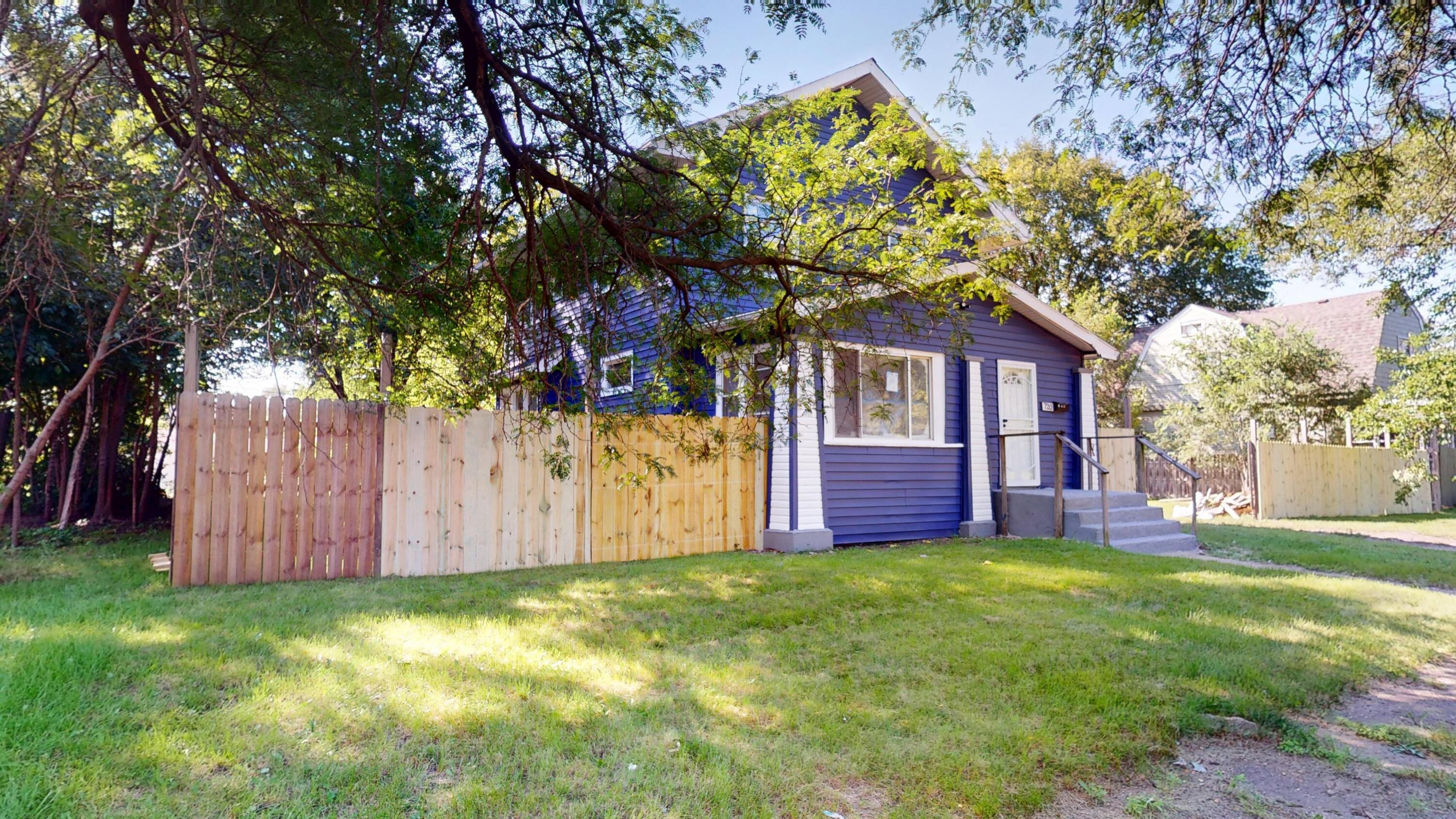 720 Maryland Street Gary, IN 46402 - Photo 4 of 38 a view of a house with a yard and tree s