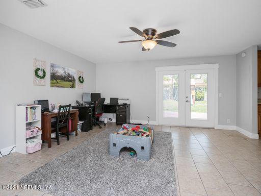 1034 Acapulco Road Jacksonville, FL 32216 - Photo 12 of 27 playroom/ living room