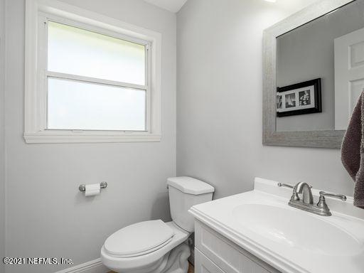 1034 Acapulco Road Jacksonville, FL 32216 - Photo 21 of 27 half bath off kitchen