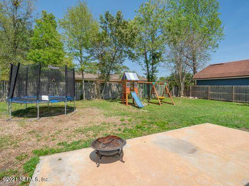 1034 Acapulco Road Jacksonville, FL 32216 - Photo 25 of 27 backyard from backdoor view