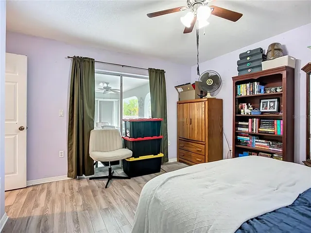 a dining room with furniture a chandelier and a rug