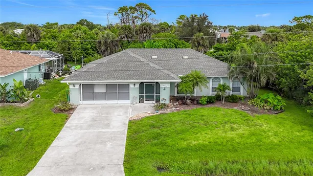 a backyard of a house with lots of green space