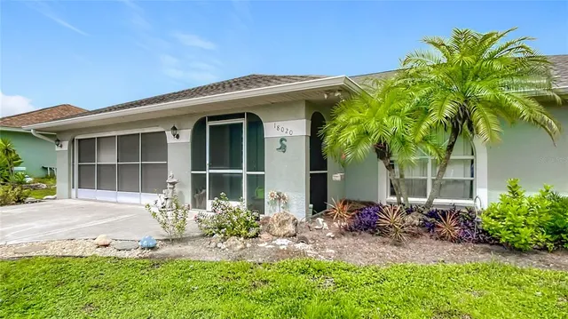 a view of a city with a building in the background