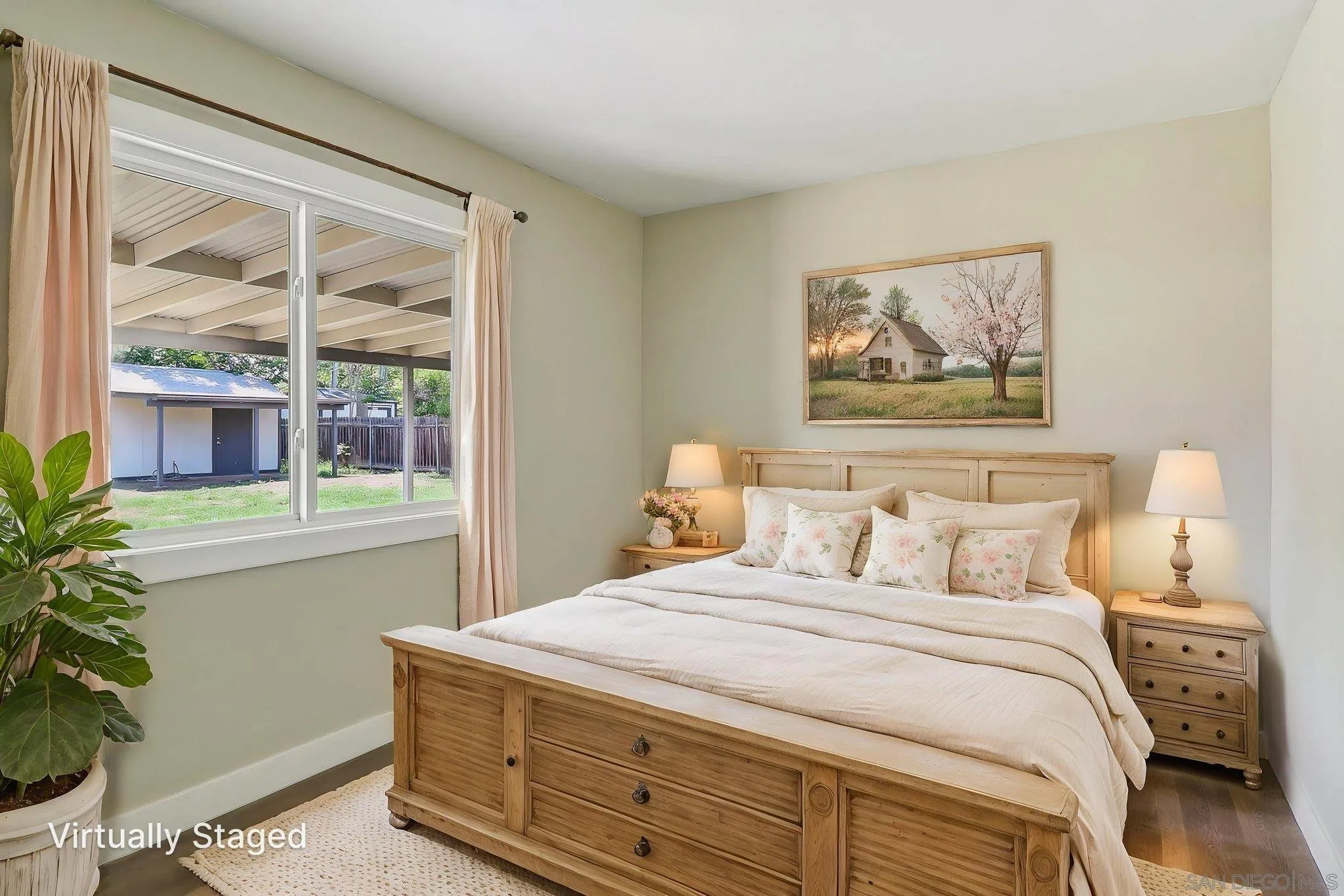 9055 Gorge Avenue Santee, CA 92071 - Photo 15 of 28 a bedroom with a bed and a painting on the wall