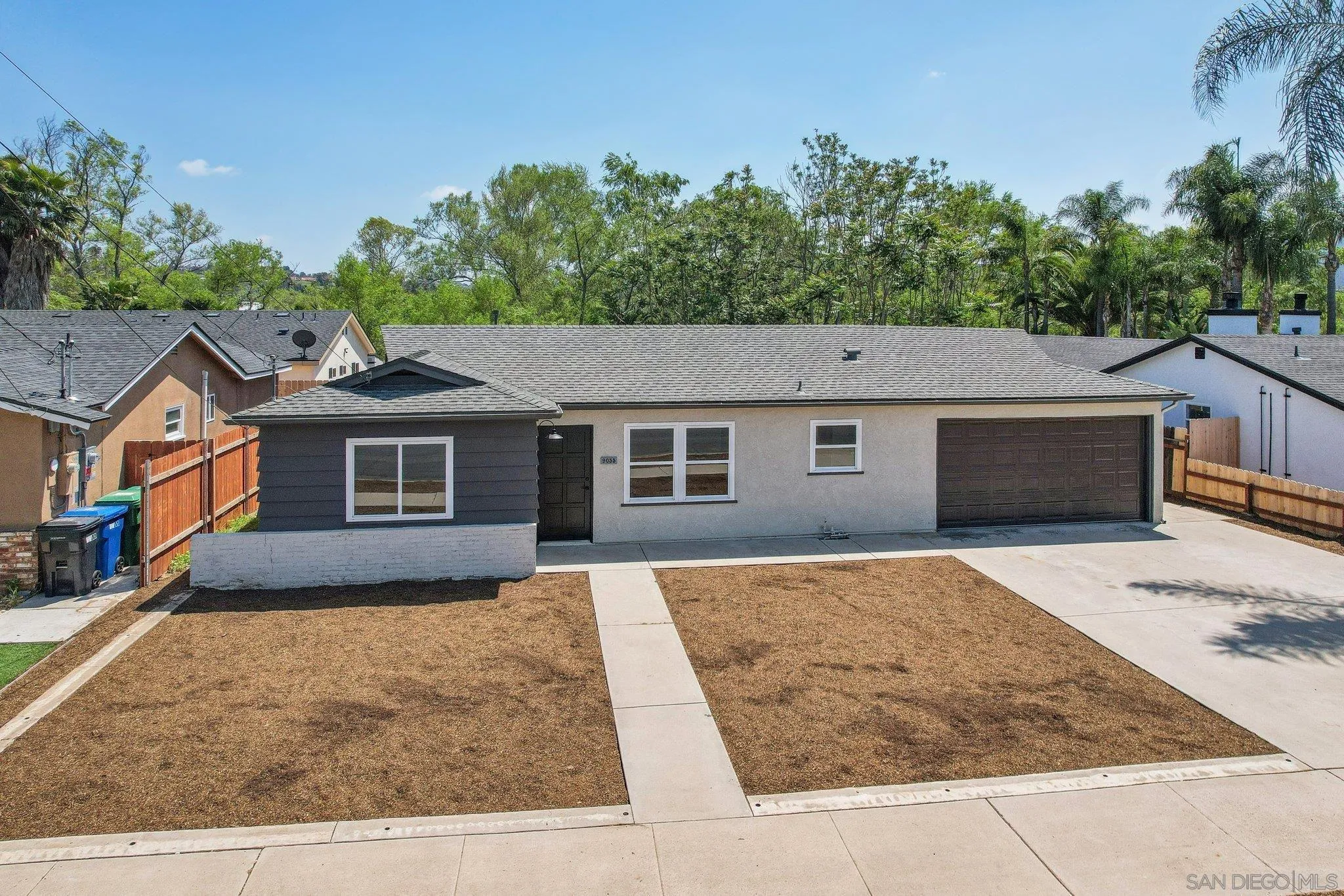 9055 Gorge Avenue Santee, CA 92071 - Photo 24 of 28 front view of a house with a yard