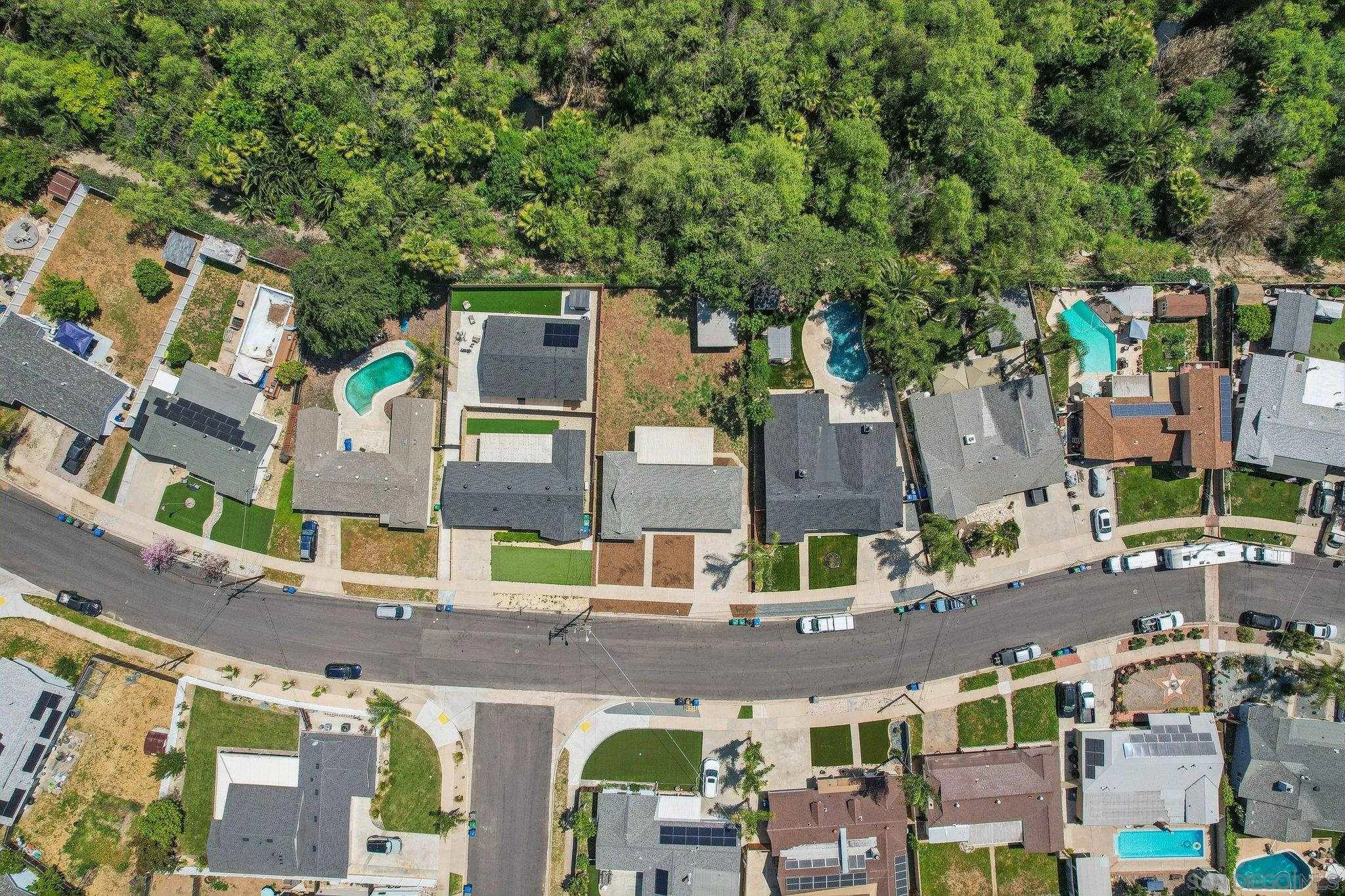 9055 Gorge Avenue Santee, CA 92071 - Photo 28 of 28 an aerial view of multiple houses with yard