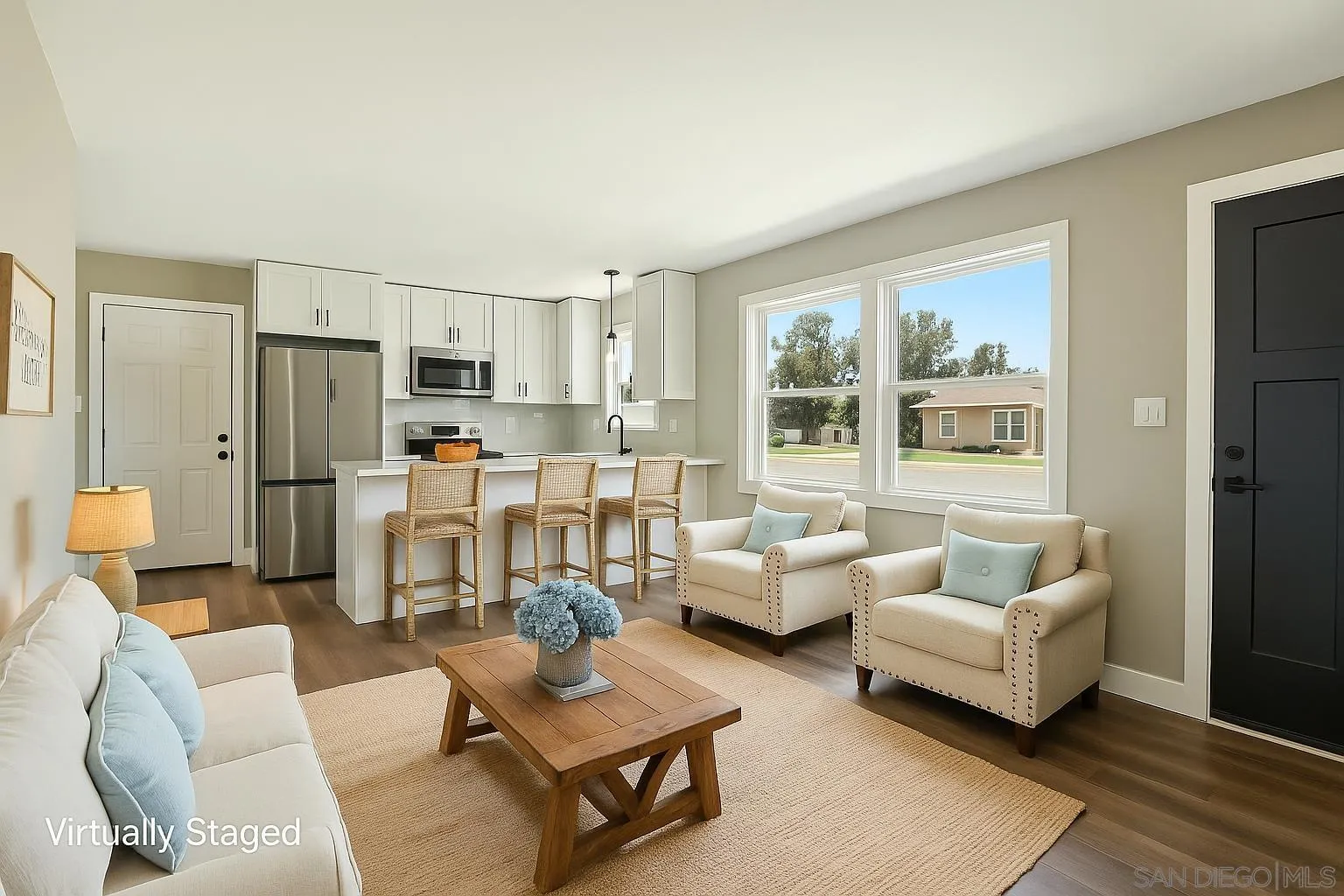 9055 Gorge Avenue Santee, CA 92071 - Photo 3 of 28 a living room with furniture and a large window