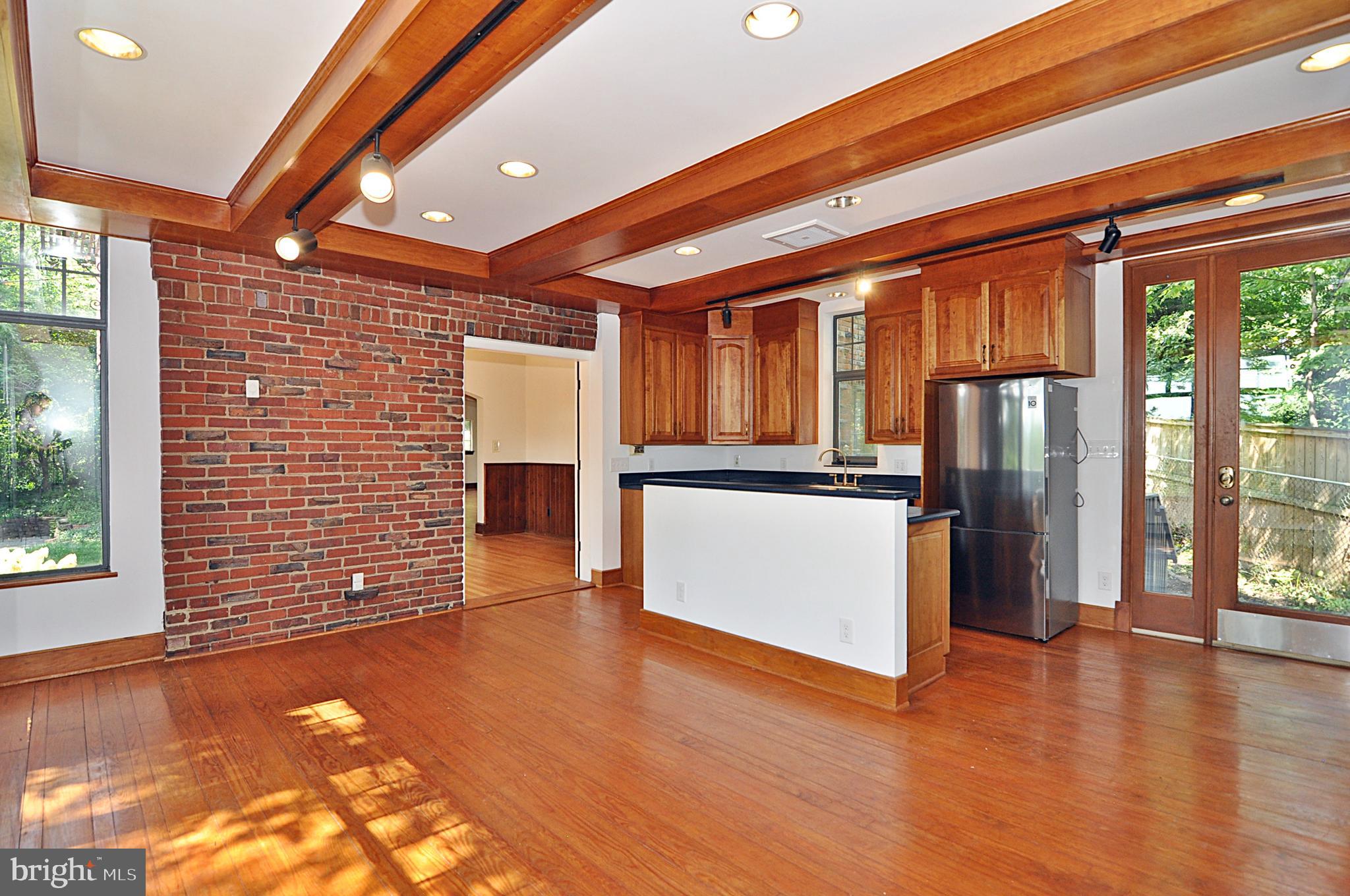 2721 South Arlington Ridge Road Arlington, VA 22202 - Photo 13 of 33 a view of a kitchen with a stove and a window