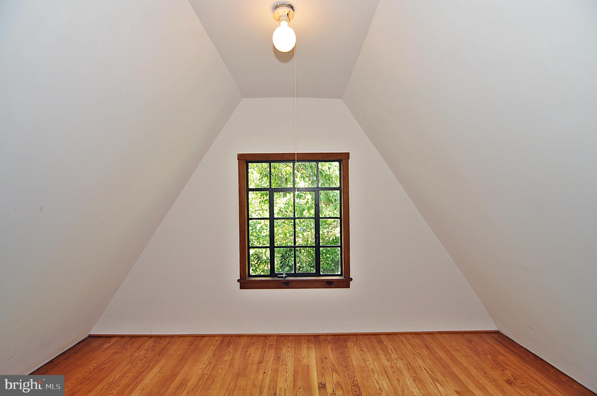 2721 South Arlington Ridge Road Arlington, VA 22202 - Photo 18 of 33 wooden floor in an empty room with a window