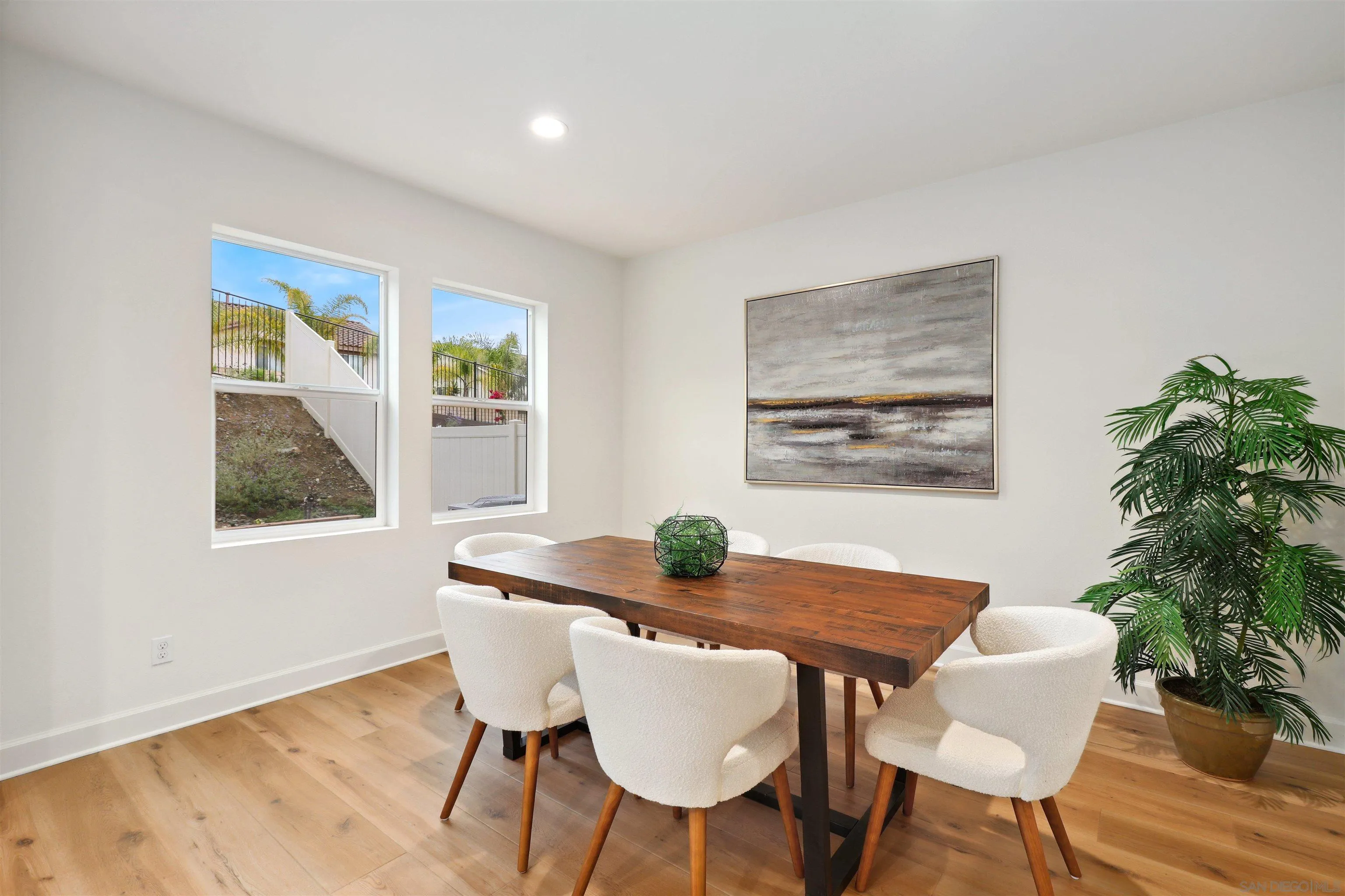 929 Woodhaven Road San Marcos, CA 92069 - Photo 13 of 36 a dining room with furniture and window