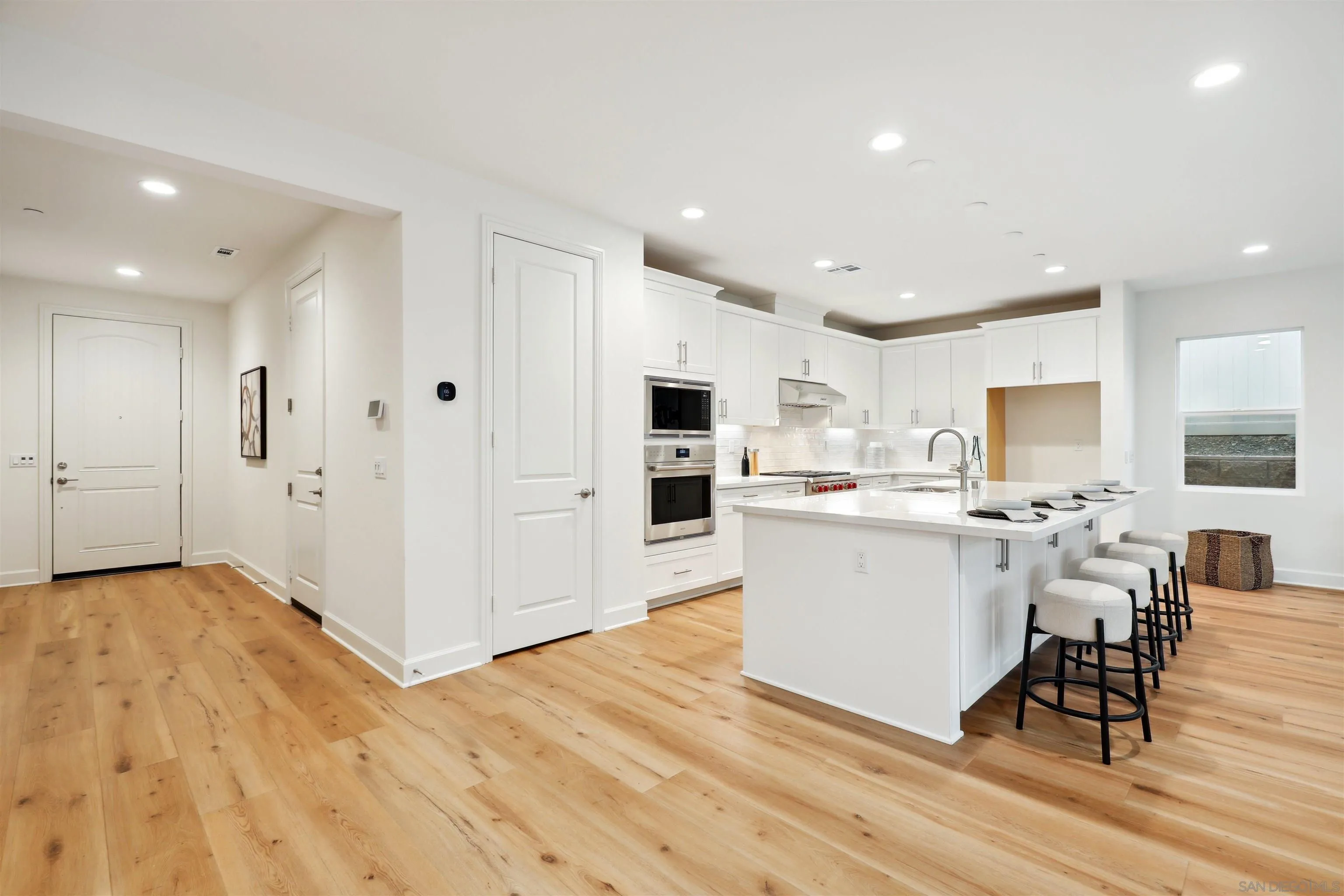 929 Woodhaven Road San Marcos, CA 92069 - Photo 10 of 36 a view of kitchen with cabinets and wooden floor