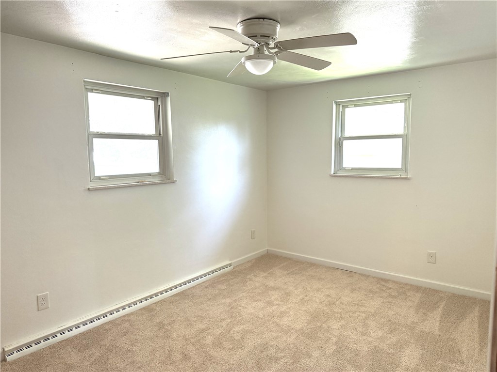 4732 Lehigh Drive Springfield, OH 45503 - Photo 11 of 27 This airy bedroom offers a comfortable and inviting atmosphere, perfect for unwinding.