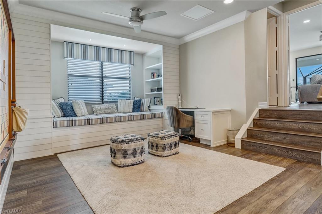 4663 Azalea Drive Naples, FL 34119 - Photo 23 of 34 a bedroom with furniture and a large window