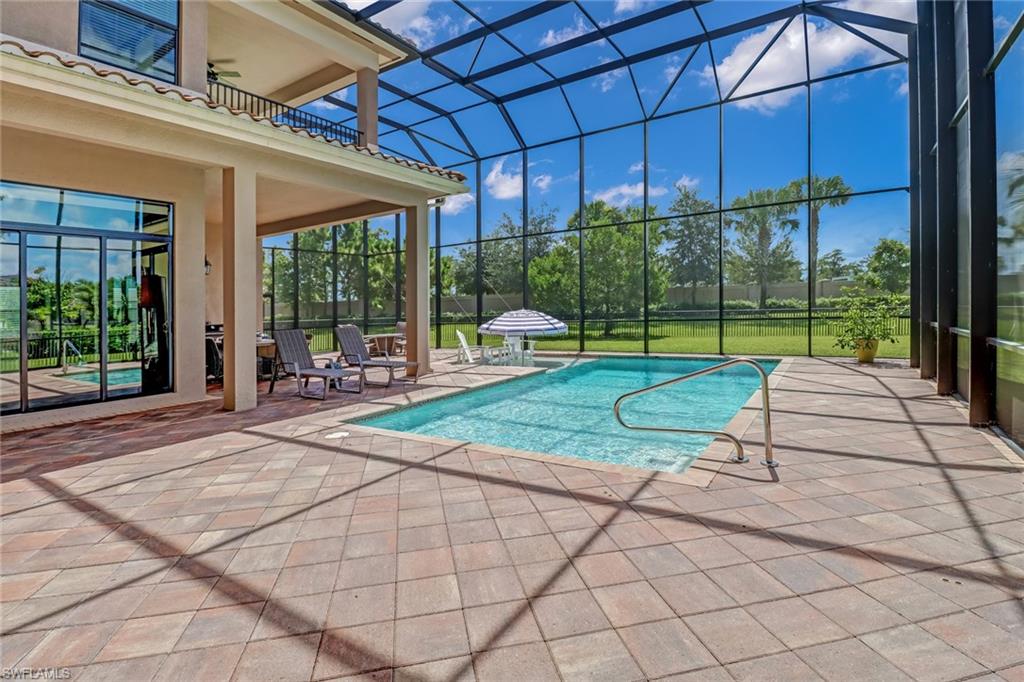 4663 Azalea Drive Naples, FL 34119 - Photo 3 of 34 a view of a patio with a backyard