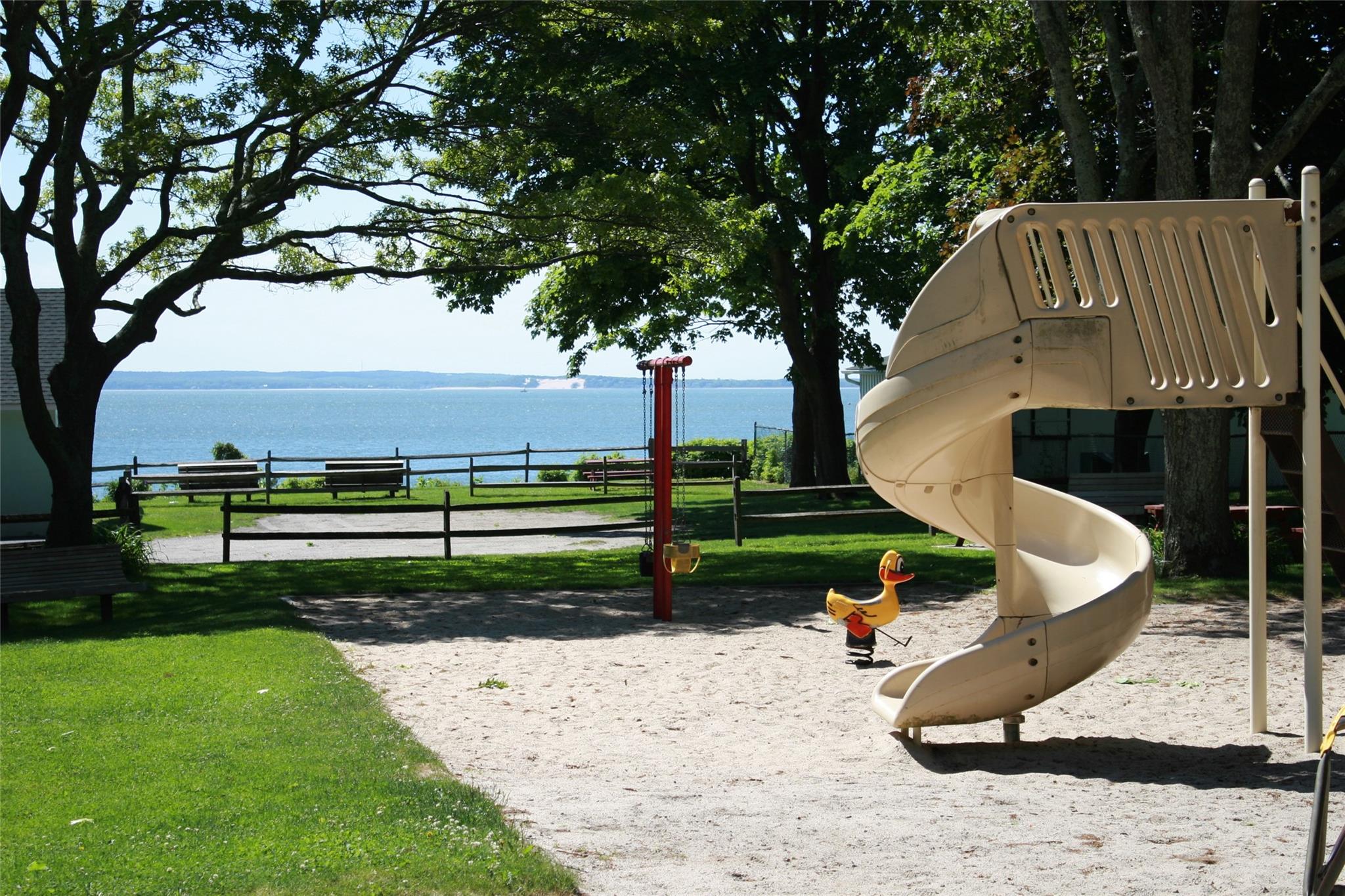 275 Hamilton Avenue Cutchogue, NY 11935 - Photo 11 of 17 a view of a park with large trees