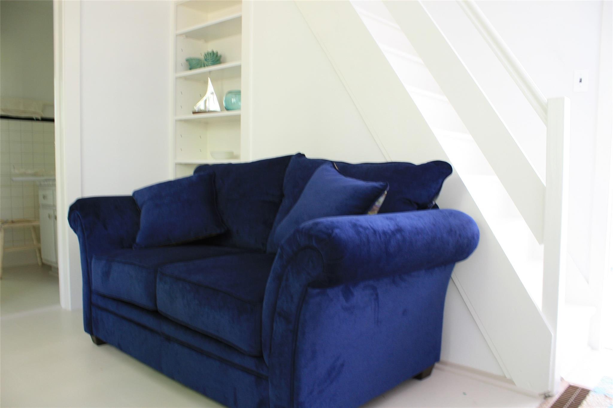 275 Hamilton Avenue Cutchogue, NY 11935 - Photo 3 of 17 a living room with furniture and a wooden floor