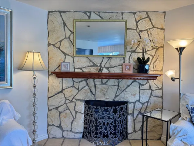 a view of entryway with furniture and wooden floor