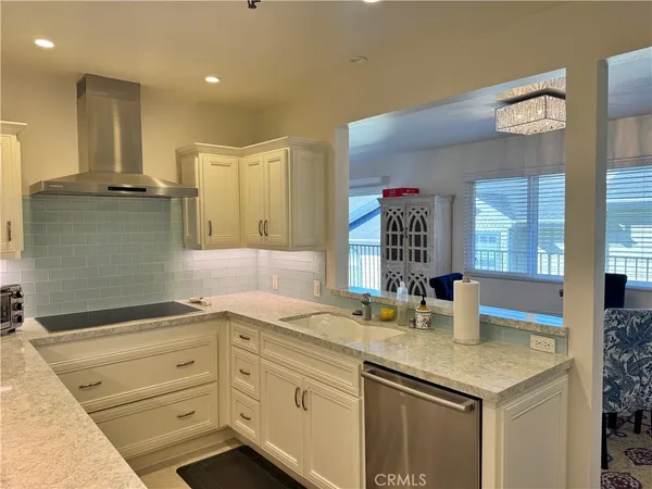 a kitchen with a sink and a window