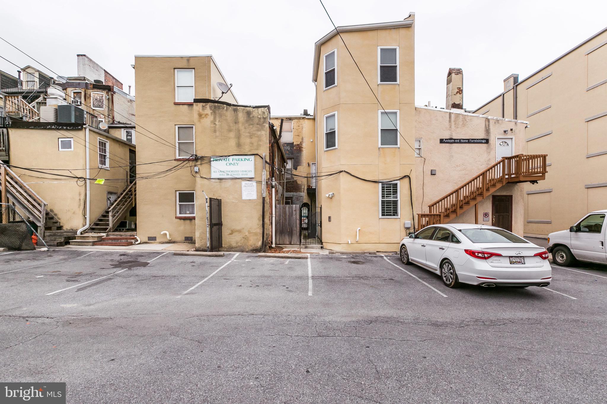 910 South Charles Street, Unit B Baltimore, MD 21230 - Photo 29 of 37 Rear Exterior - Parking In Lot (Extra Cost)