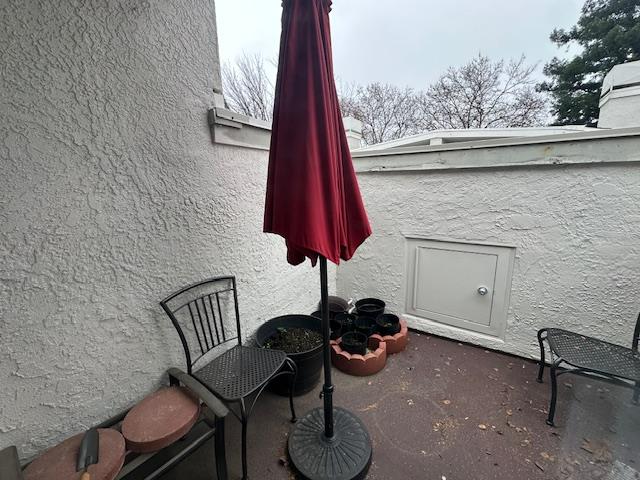 2511 Fulton Square Lane, Unit 9 Sacramento, CA 95821 - Photo 15 of 19 a view of a room with a chair and a potted plant