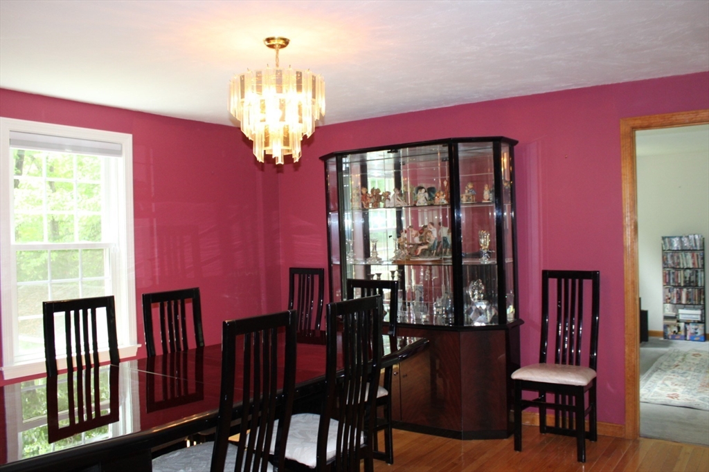 27 Gretchen Way Raynham, MA 02767 - Photo 8 of 20 a view of a dining room with furniture window and outside view