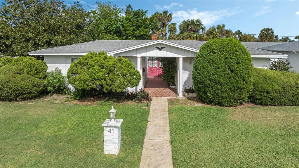 Restricted Address Ormond Beach, FL 32176 - Photo 1 of 1 a front view of a house with a yard