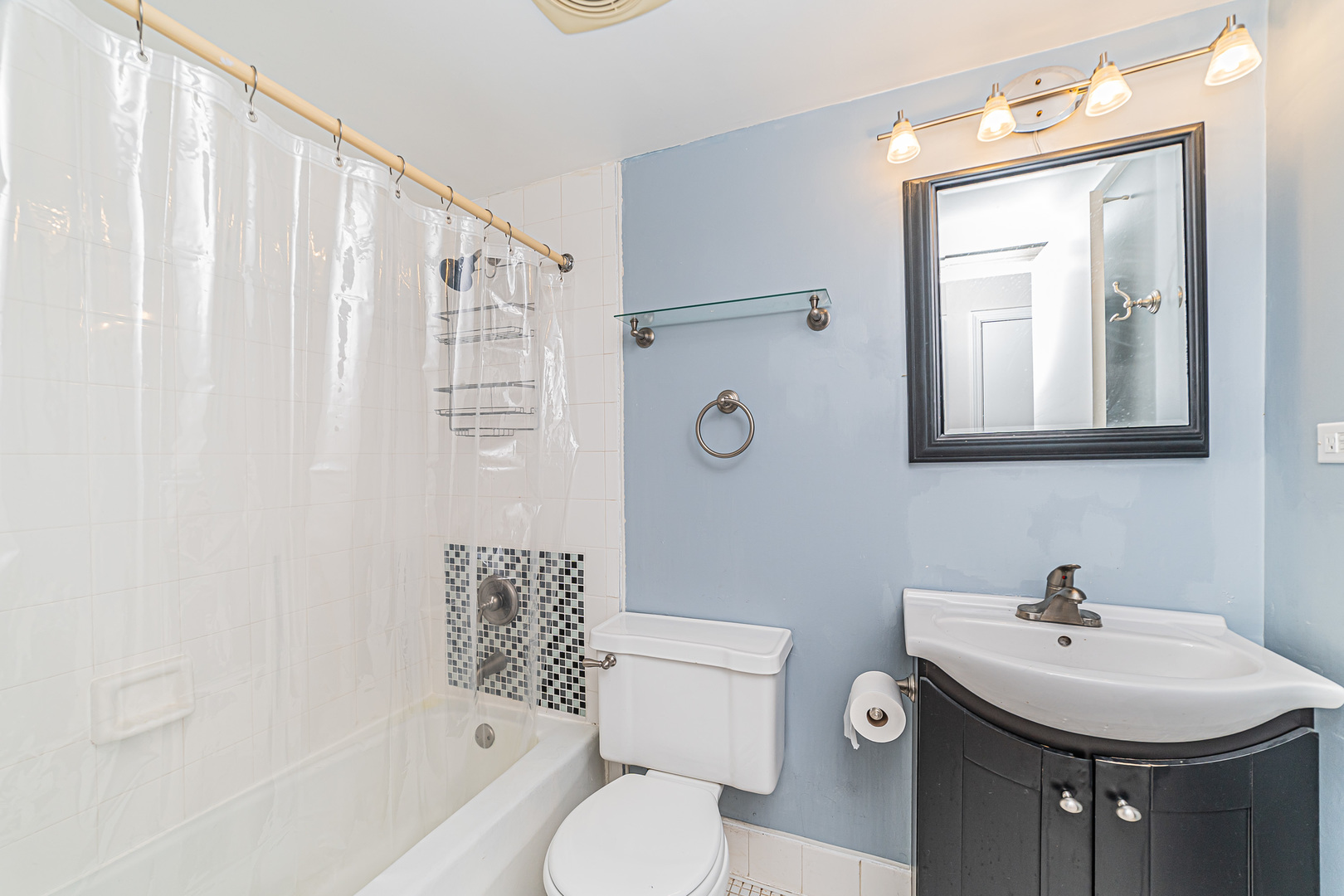 714 East Algonquin Road, Unit J101 Arlington Heights, IL 60005 - Photo 23 of 28 a bathroom with a sink toilet and shower
