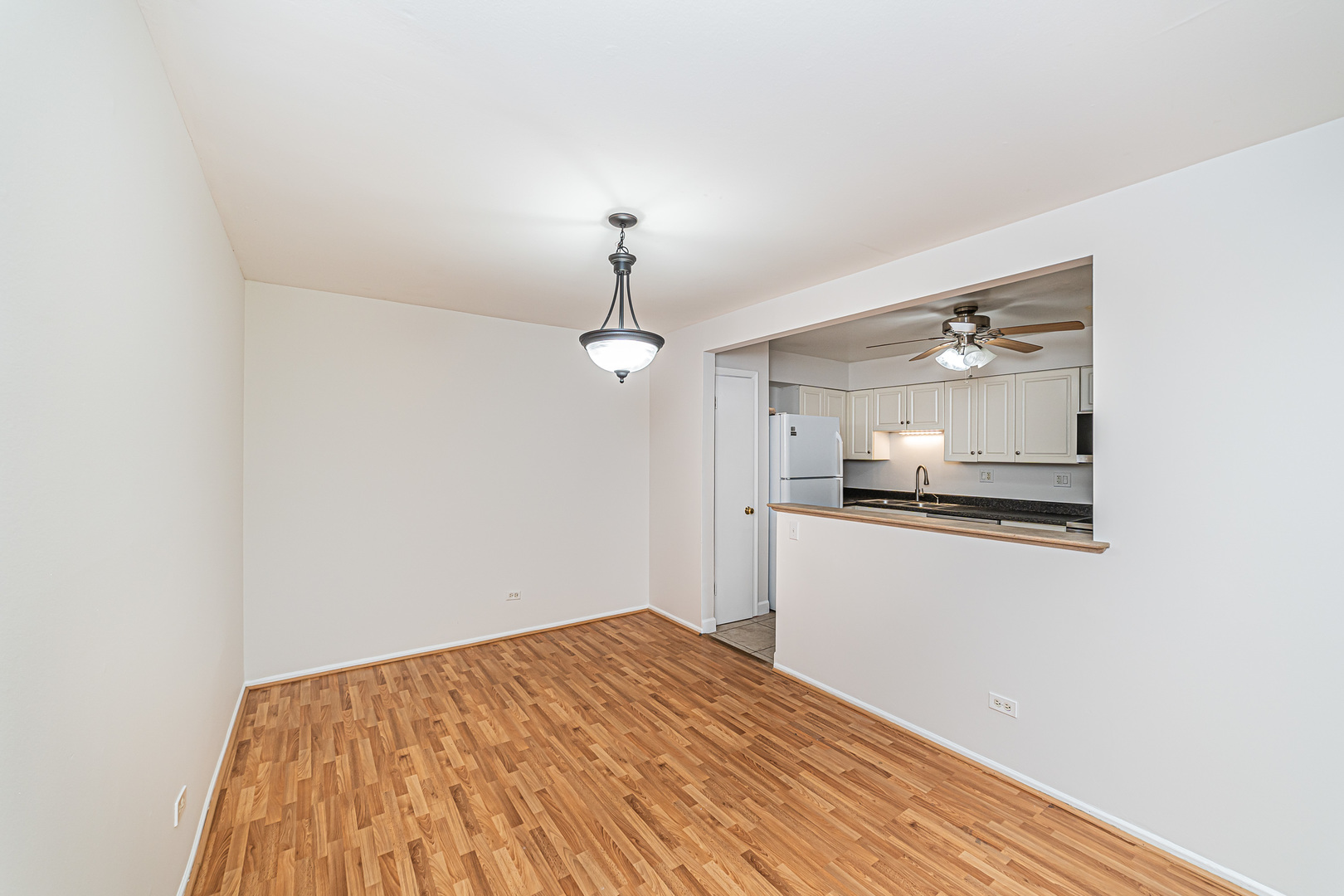 714 East Algonquin Road, Unit J101 Arlington Heights, IL 60005 - Photo 10 of 28 a bathroom with a sink and a mirror