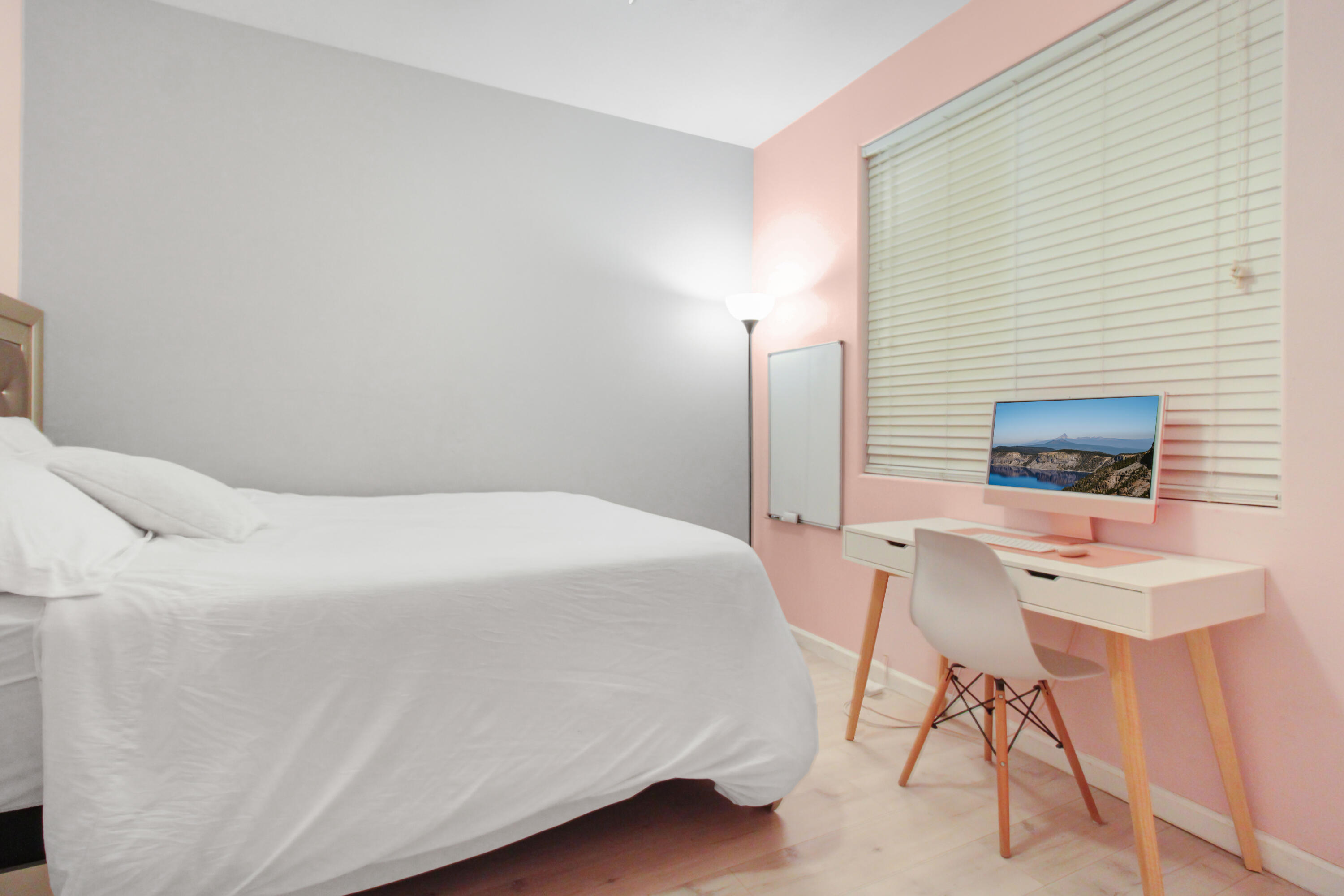 82949 Corte Lucia Indio, CA 92201 - Photo 17 of 36 a bedroom with a bed a desk and chair