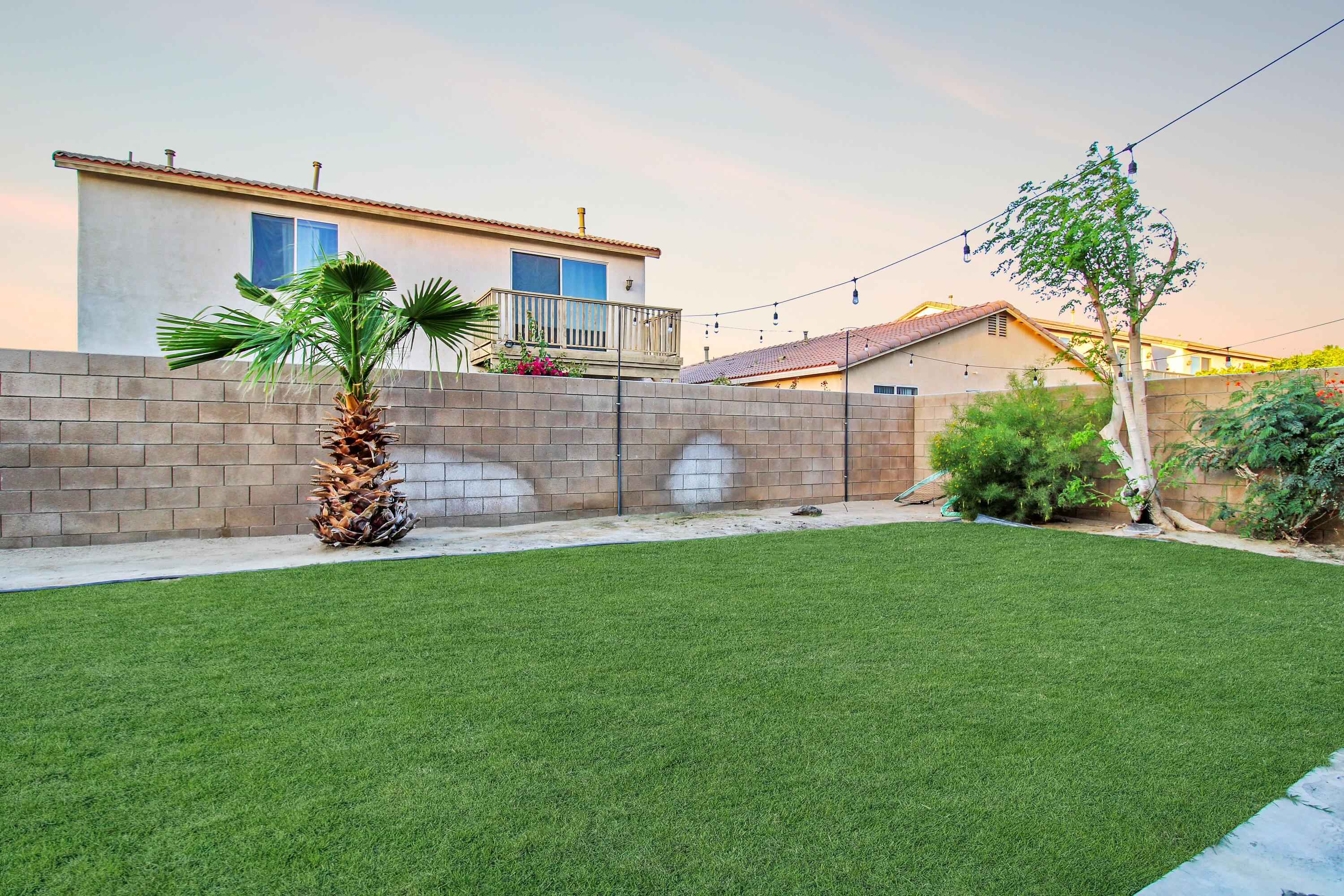 82949 Corte Lucia Indio, CA 92201 - Photo 20 of 36 a front view of a house with garden