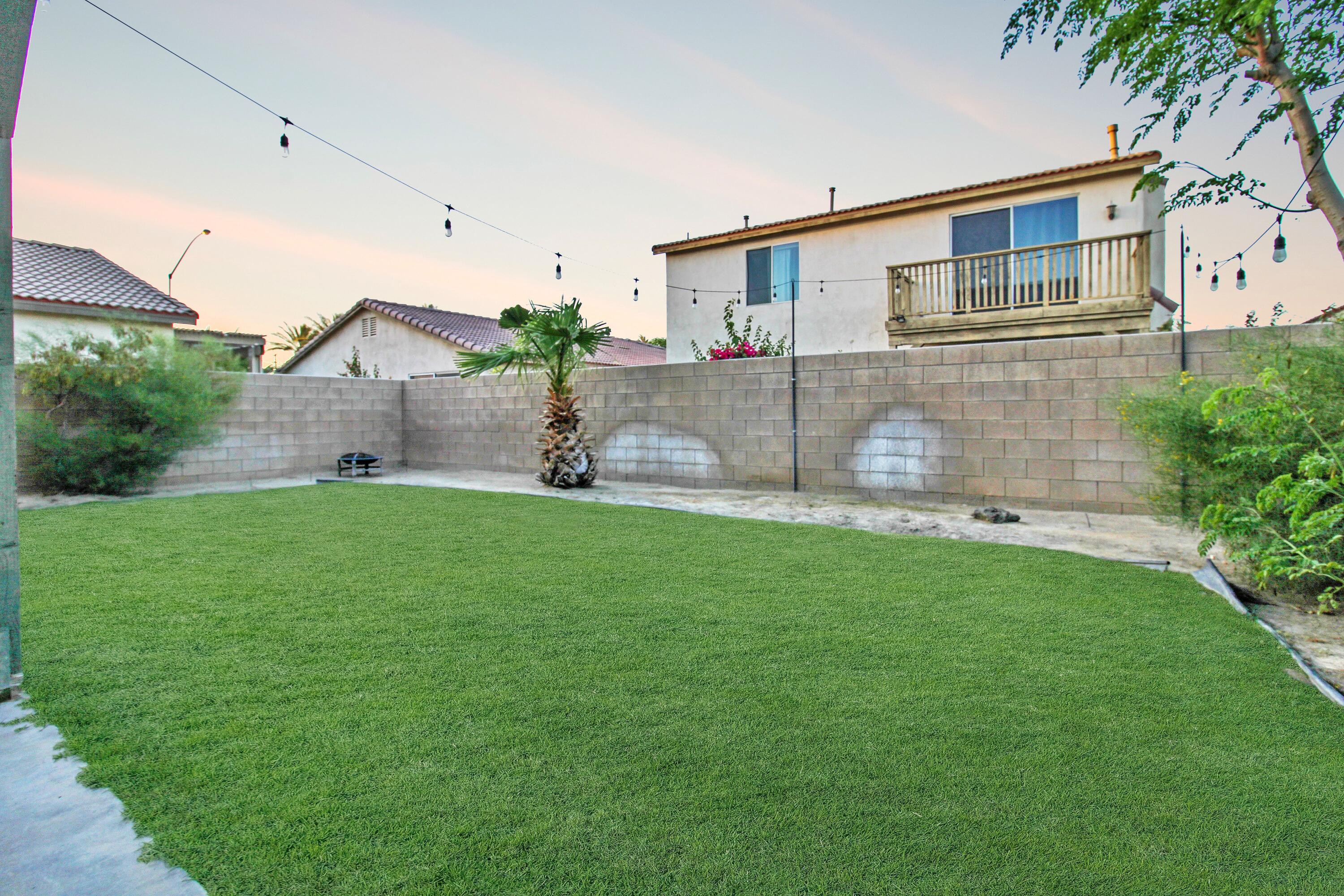 82949 Corte Lucia Indio, CA 92201 - Photo 21 of 36 a front view of house with yard and green space