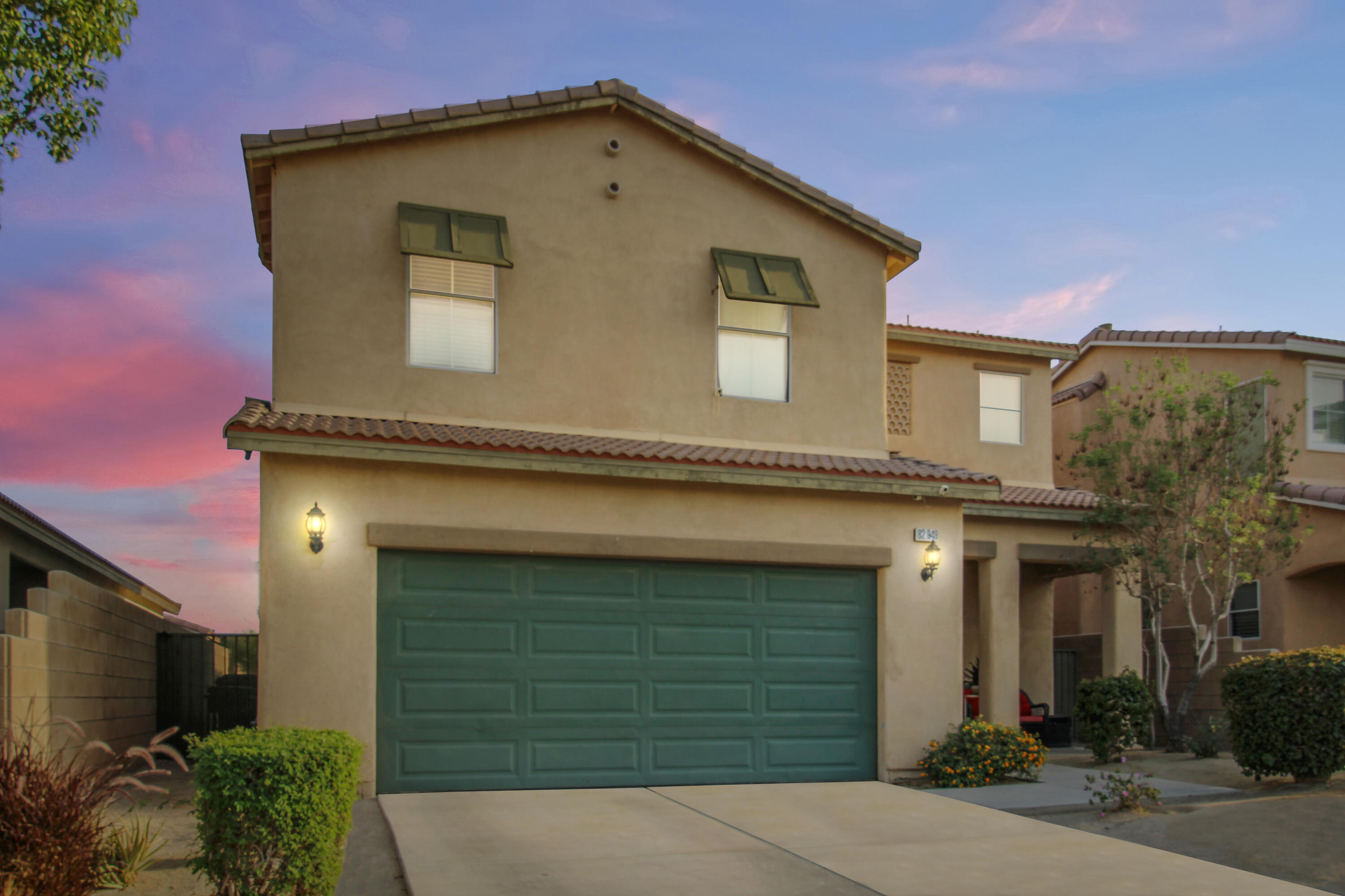 82949 Corte Lucia Indio, CA 92201 - Photo 23 of 36 a front view of a house