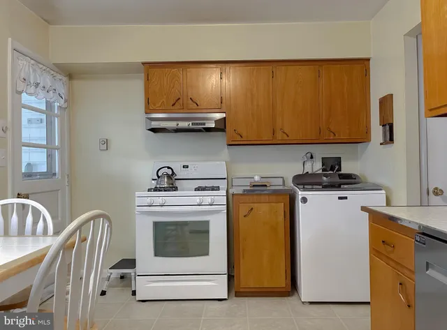 a bedroom with a bed and a desk